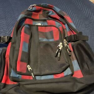 Plaid Backpack with Red and Blue Accents